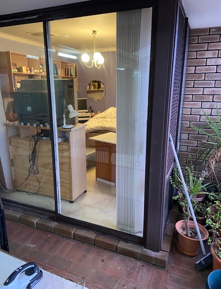 Sliding glass door into a home office after glass repair