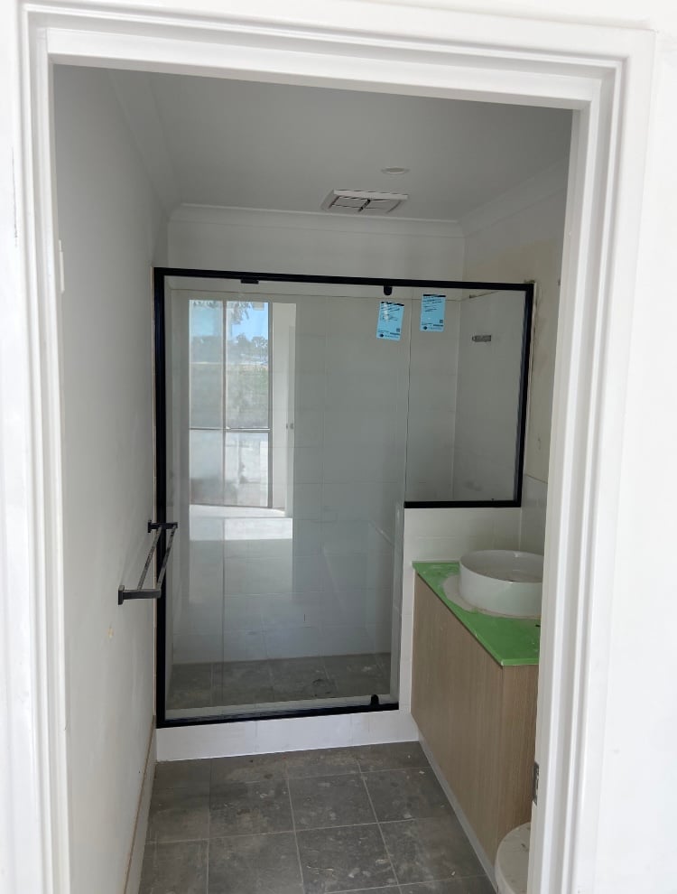 Frameless glass shower screen installation