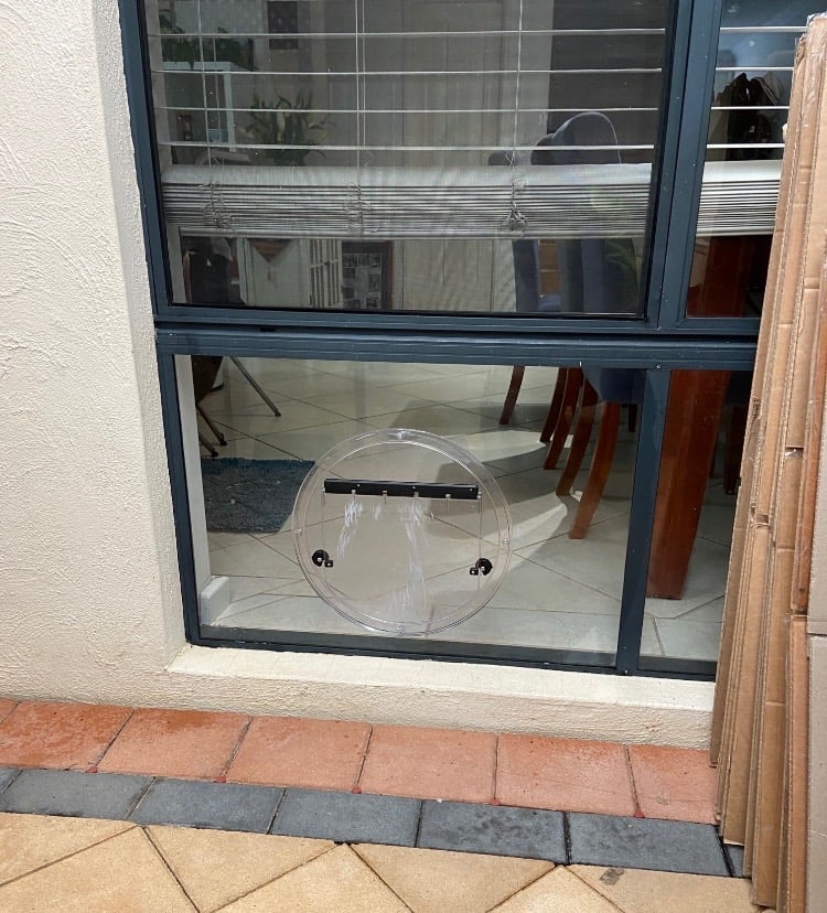 Pet door installed in a glass sliding door
