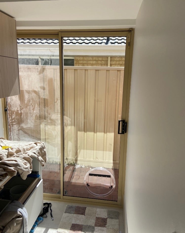 Sliding glass door with a pet door fitted
